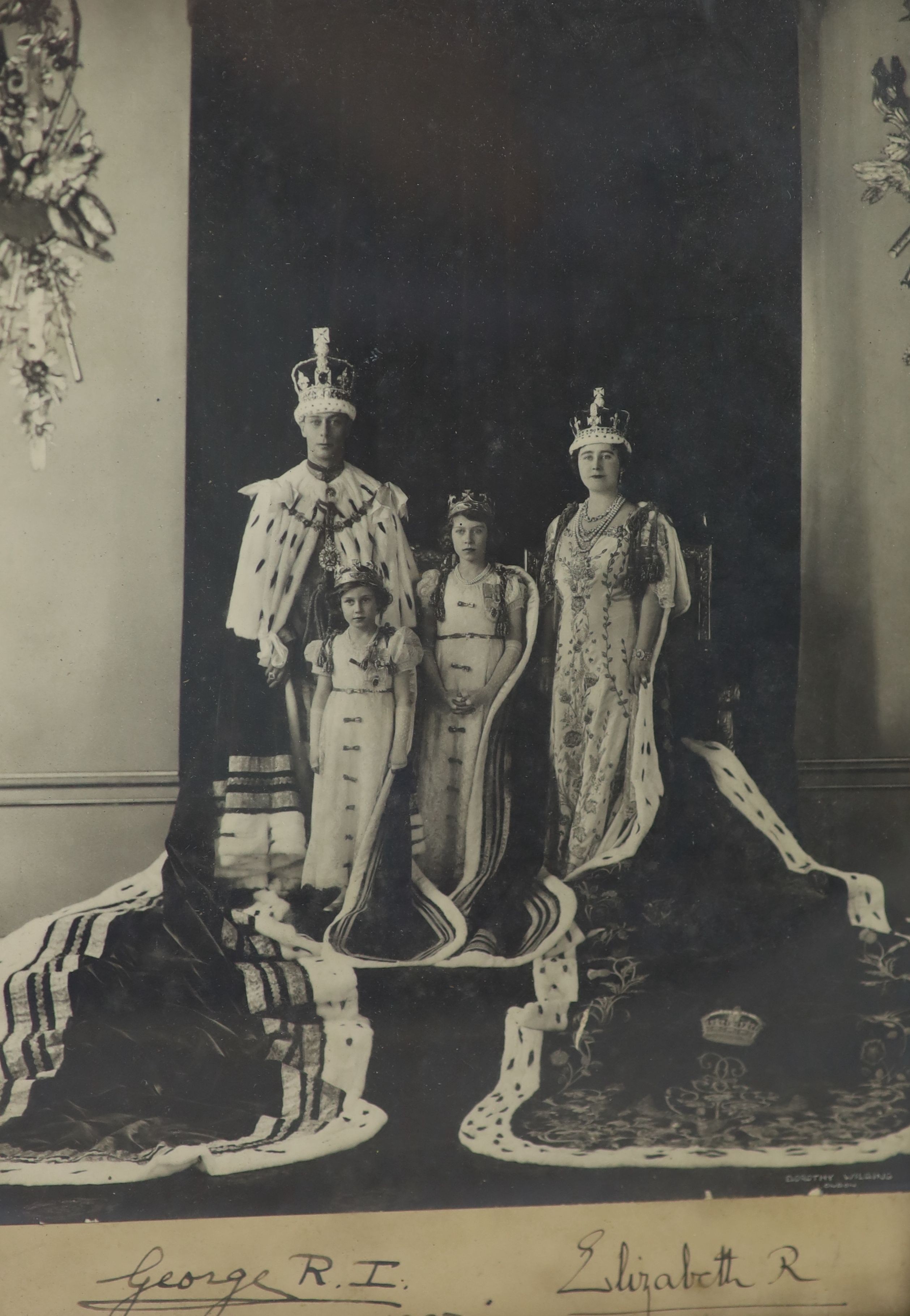 Royal Interest - a signed photograph of George VI, Queen Elizabeth and Princesses Elizabeth and Margaret in formal robes, dated 1937, Frame 32 x 24 cm